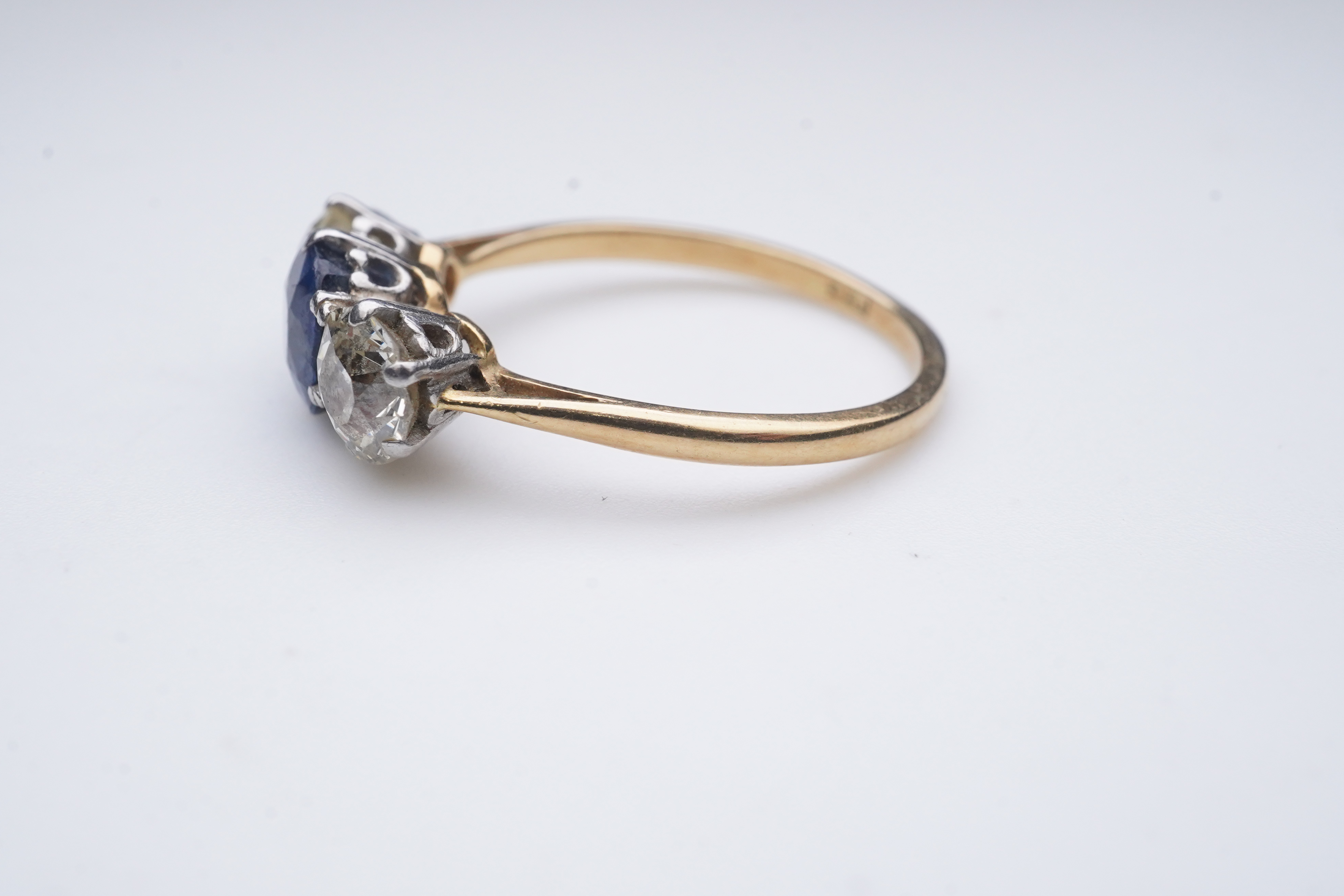 A sapphire and diamond three-stone ring, early 20th century